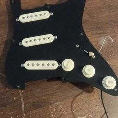 Strat pickguard wired with Fender Noiseless and premium components