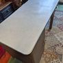 industrial steel desk featuring a light-colored laminate top Image 3