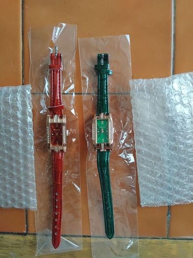 2 womans quartz watches with leather straps