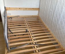 Double standard bed with baby bed barrier