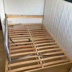 Double standard bed with baby bed barrier