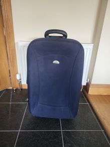 Large navy suitcase