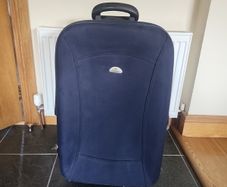 Large navy suitcase