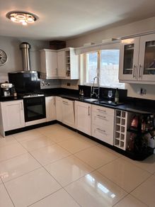 Whole Kitchen, including cabinets, granite countertops, appliances, oven hood, sink and tap