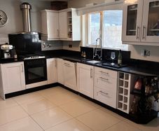 Whole Kitchen, including cabinets, granite countertops, appliances, oven hood, sink and tap