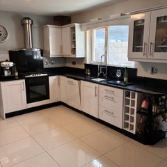 Whole Kitchen, including cabinets, granite countertops, appliances, oven hood, sink and tap