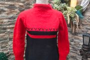 red and black long sleeve high neckline sweater