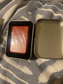 Brand new, Red zippo style lighter in metal casing
