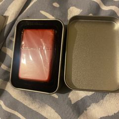 Brand new, Red zippo style lighter in metal casing