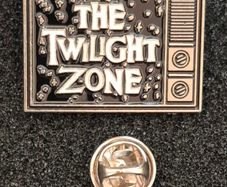 The twilight zone, pin back badge.