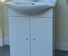 bathroom sink and vanity cabinet