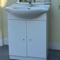 bathroom sink and vanity cabinet