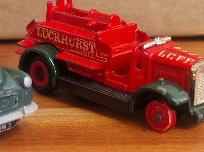 4 vintage toy cars -