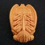 Carved wooden cicada. Image 5