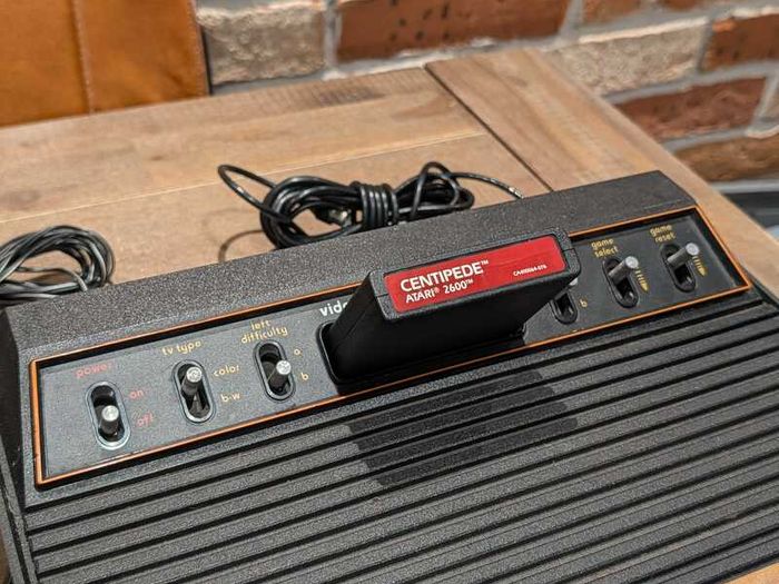 Immaculate Atari 2600 with Two joysticks and Two paddles and Centipede game