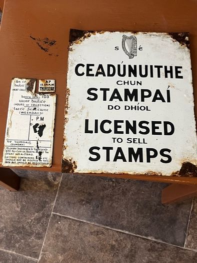 Original Enamel signs license to sell stamps. Collection times and days