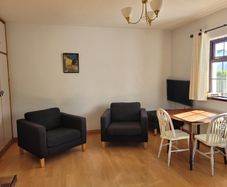 Chairs- Ikea Karlstad Armchair and Footstool