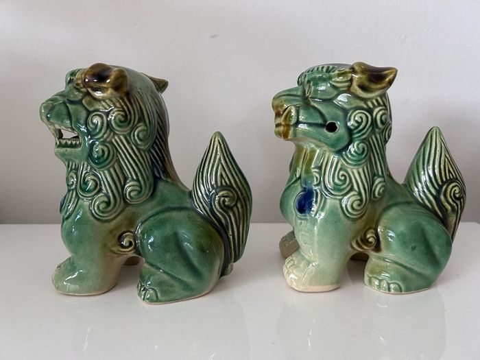 Two vintage Foo dogs in beautiful green glaze