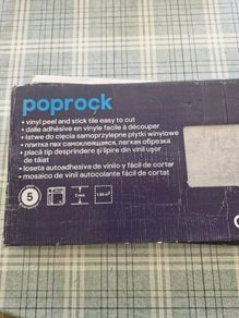 Self-adhesive floor tiles