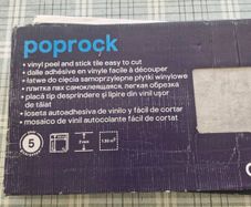 Self-adhesive floor tiles