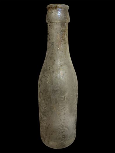 old glass mineral bottle