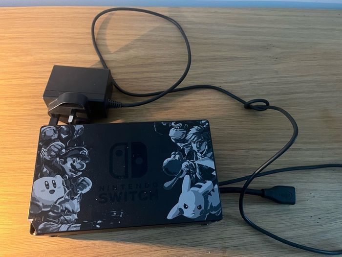 Nintendo Switch Console with Dock and Charger. Fully working, Purple and Orange joycons