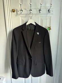 GXG Suit jacket in black with logo and pin