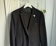 GXG Suit jacket in black with logo and pin
