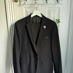 GXG Suit jacket in black with logo and pin
