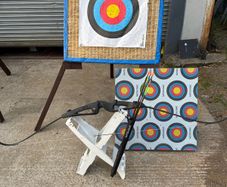 Archery bow and arrows and targets