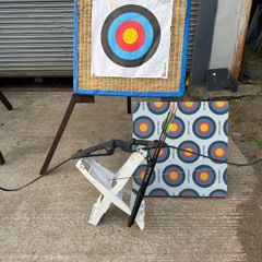 Archery bow and arrows and targets