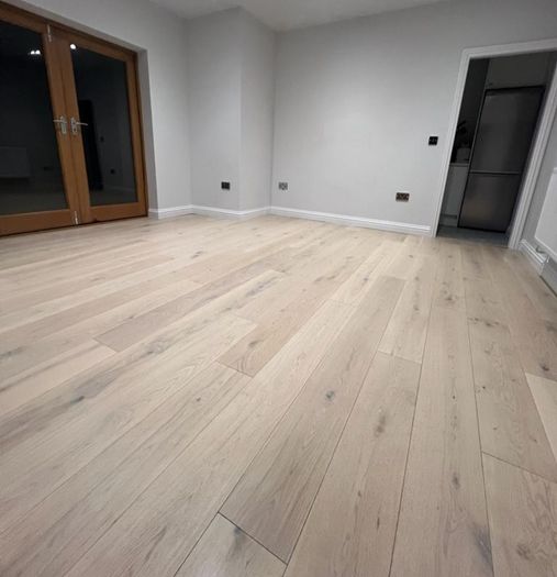 Laminated wood floor fitting