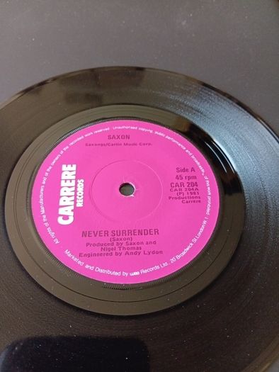 Never surrender 7" vinyl single Irish pressing SAXON