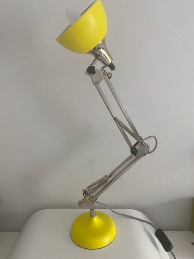 Yellow adjustable desk lamp with Chrome Articulated Arm