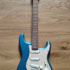 Stratocaster (Mexican) and Roland Cube 40xl amp