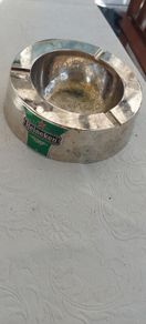 Heineken metal ashtray ,used condition, still nice condition ,buyer collects or pays postage thank you, sold as is,