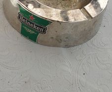 Heineken metal ashtray ,used condition, still nice condition ,buyer collects or pays postage thank you, sold as is,
