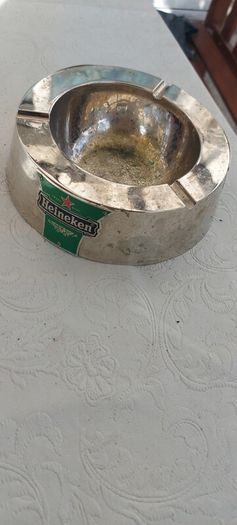 Heineken metal ashtray ,used condition, still nice condition ,buyer collects or pays postage thank you, sold as is,
