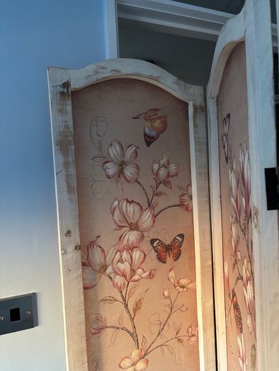 Three-panel room divider with floral and butterfly print