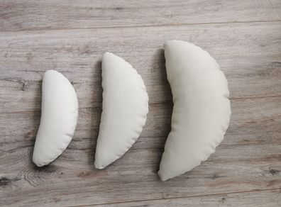 Crescent shaped pillows for newborn photoshoots