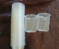 56 measuring cups for medication, brand new