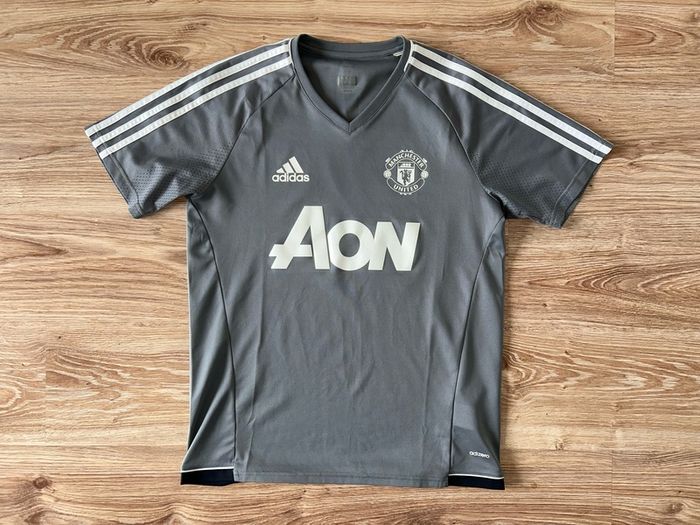 Manchester United set of TWO player issue football training jersey shirts