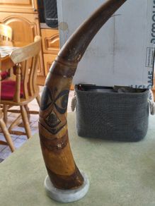 RARE  Senegal Decorated Cow Horn signed ABND. On marble plinth.