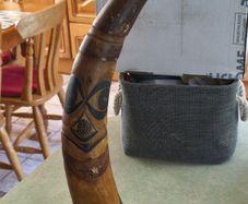 RARE  Senegal Decorated Cow Horn signed ABND. On marble plinth.