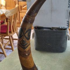 RARE  Senegal Decorated Cow Horn signed ABND. On marble plinth.