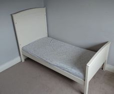 2 cot beds and 1 chest of drawers