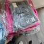 Quantity: 500 pieces  Items: Mixed T-shirts, shorts, jeans, and casual clothing  Sale type: Bulk job lot  Ideal for: Resale, retail, markets, and online businesses  Great opportunity to buy clothing in bulk at a competitive price. Sold as one job lot. Image 2
