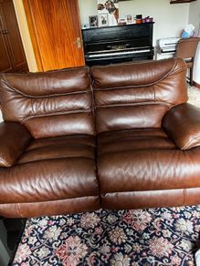 2 seater leather recliner Couch plus Pouffe.