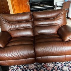 2 seater leather recliner Couch.