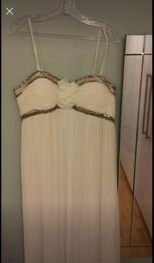 Brand new with tag designer handmade wedding dress by Dresscode. Grecian style with embellishments